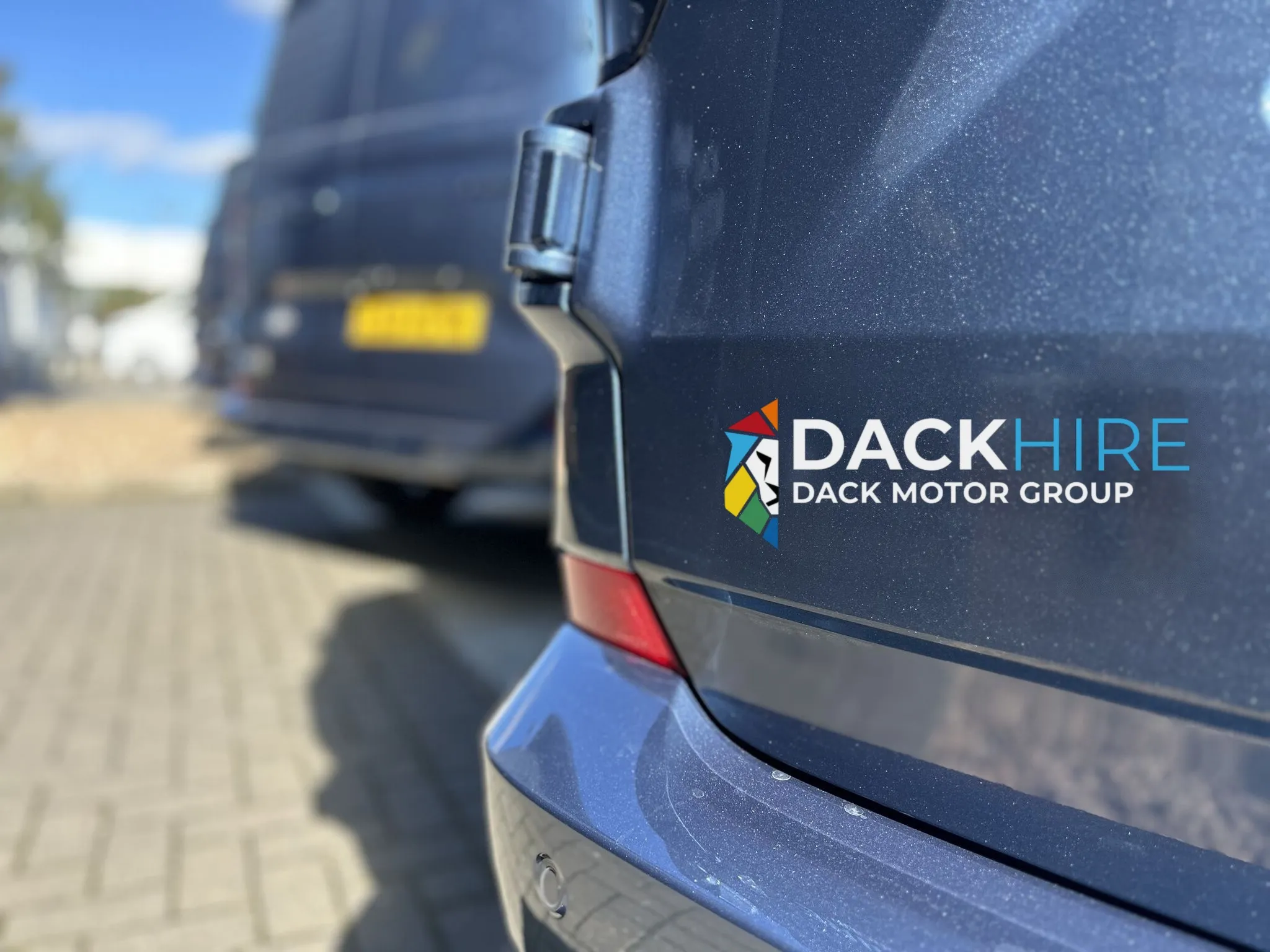 White panel van on the road — B2B flexi van hire from Dack Hire